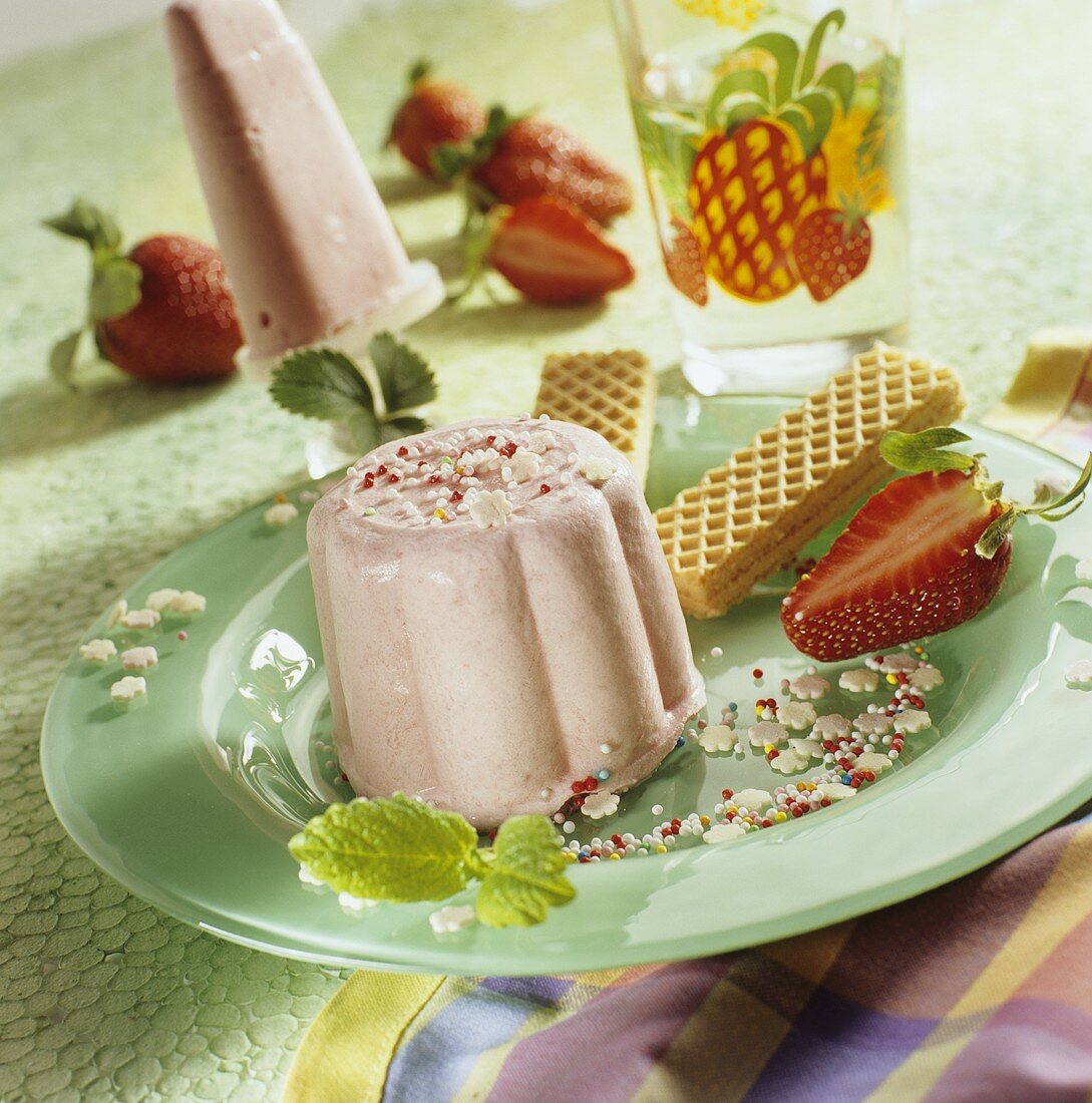Strawberry ice cream with sugar sprinkles for children