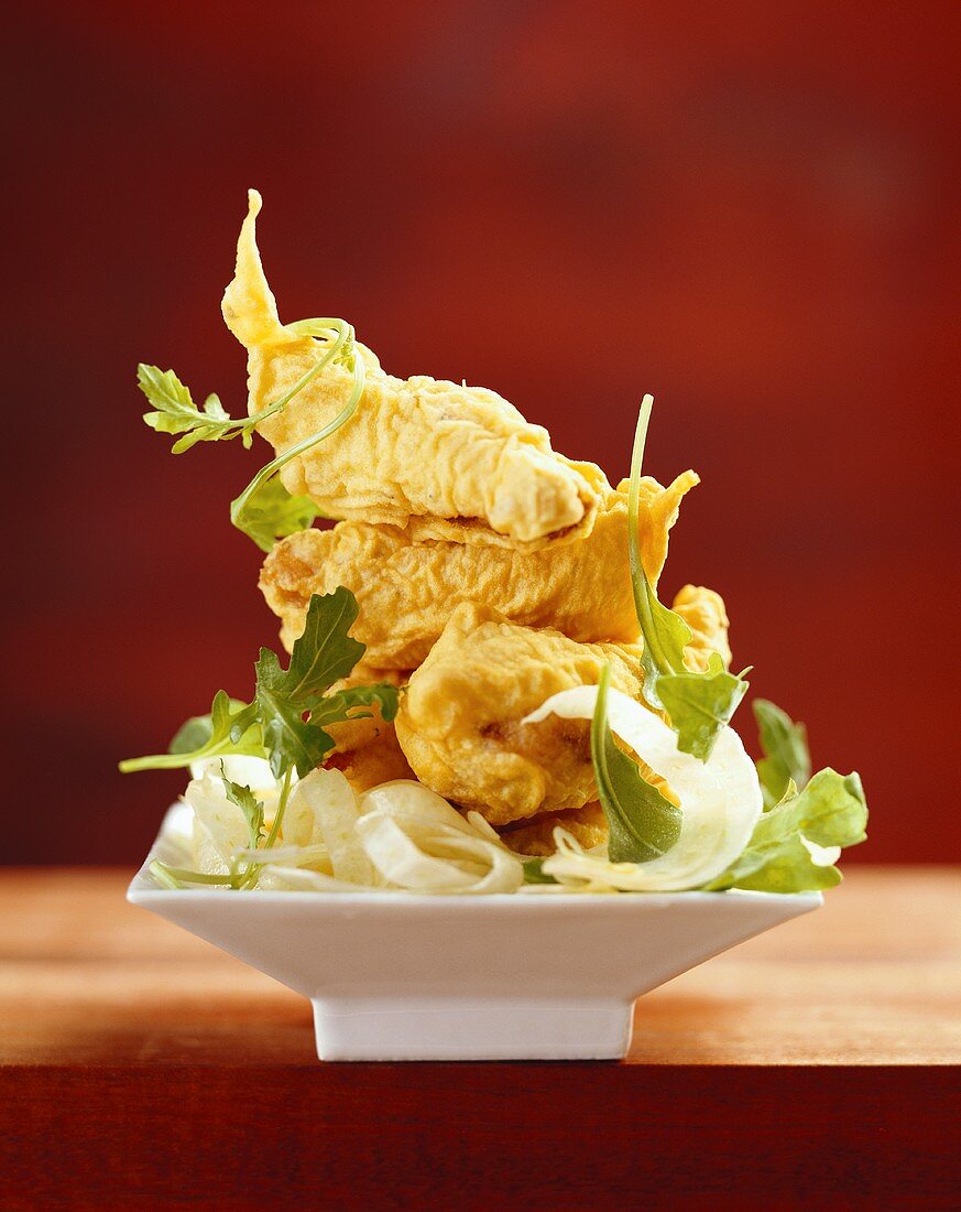 Catfish escalope in tempura batter on lettuce 