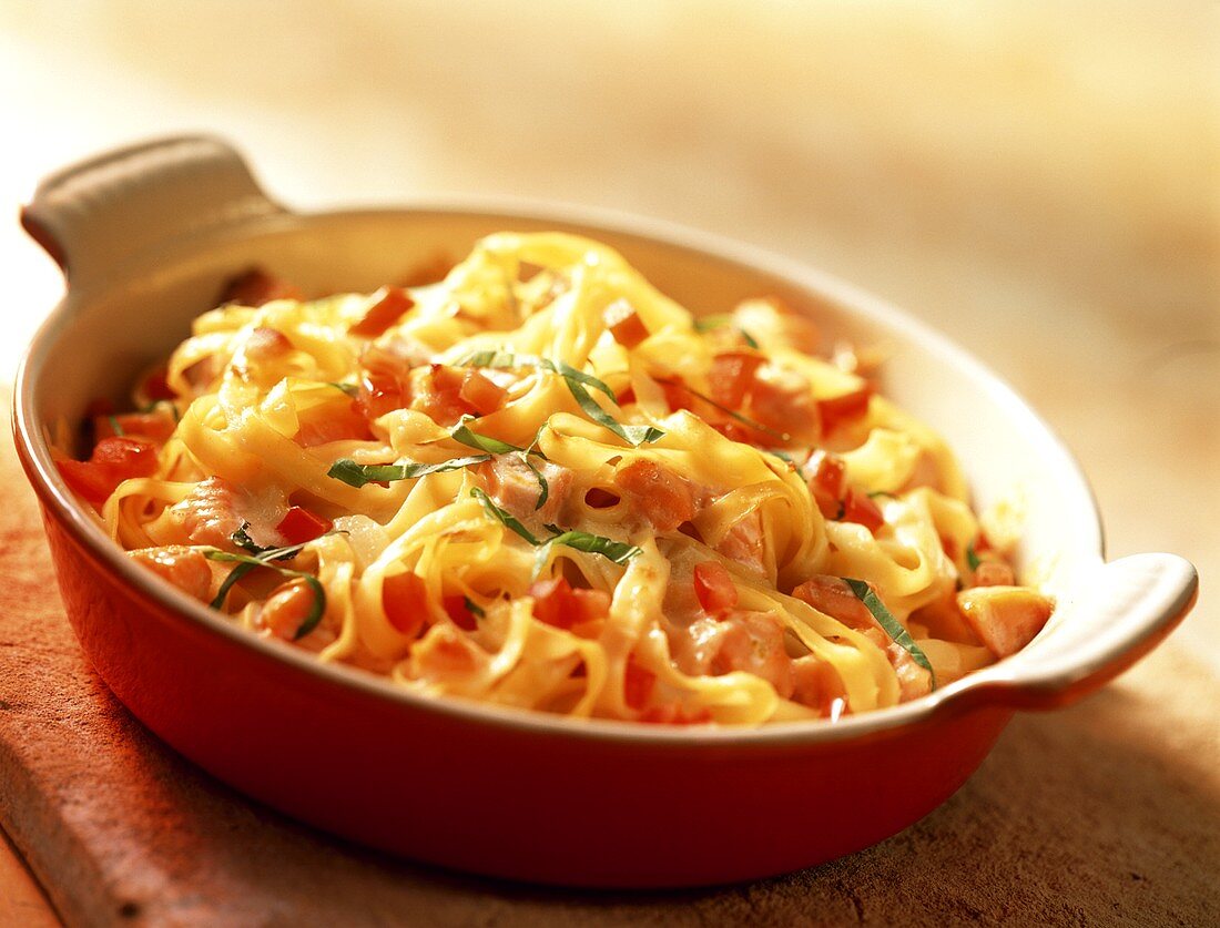 Ribbon pasta bake with salmon and tomatoes