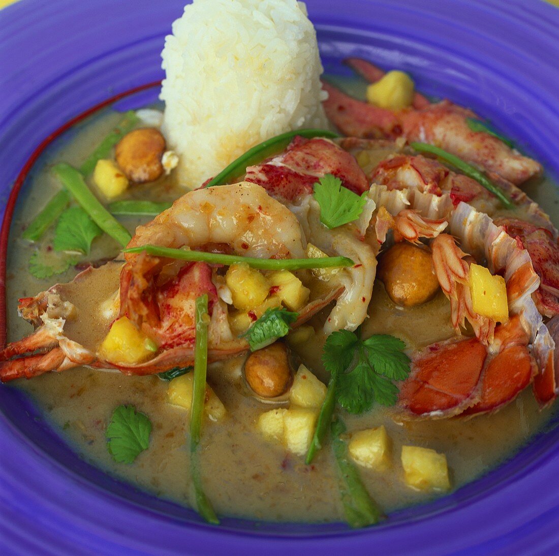 Lobster curry with shrimps and pineapple