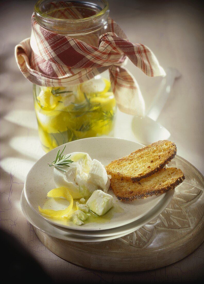 Pickled fresh goat's cheese with toast