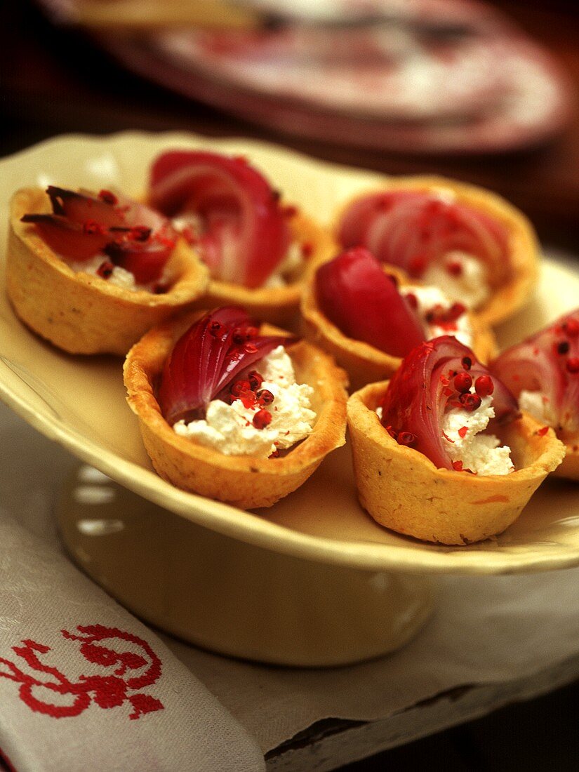 Soft cheese and onion tartlets