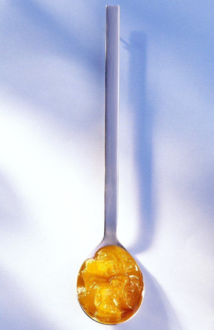 Apricot jam on spoon