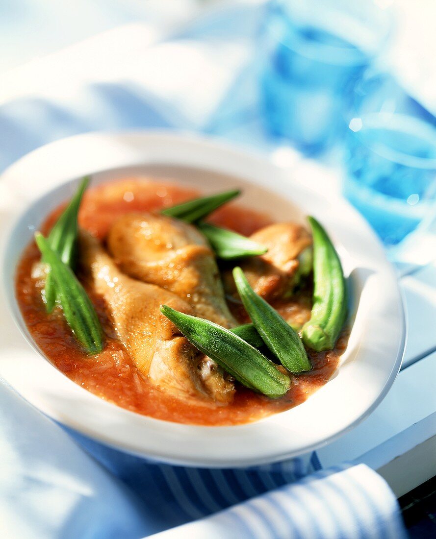 Chicken in tomato sauce with okra pods