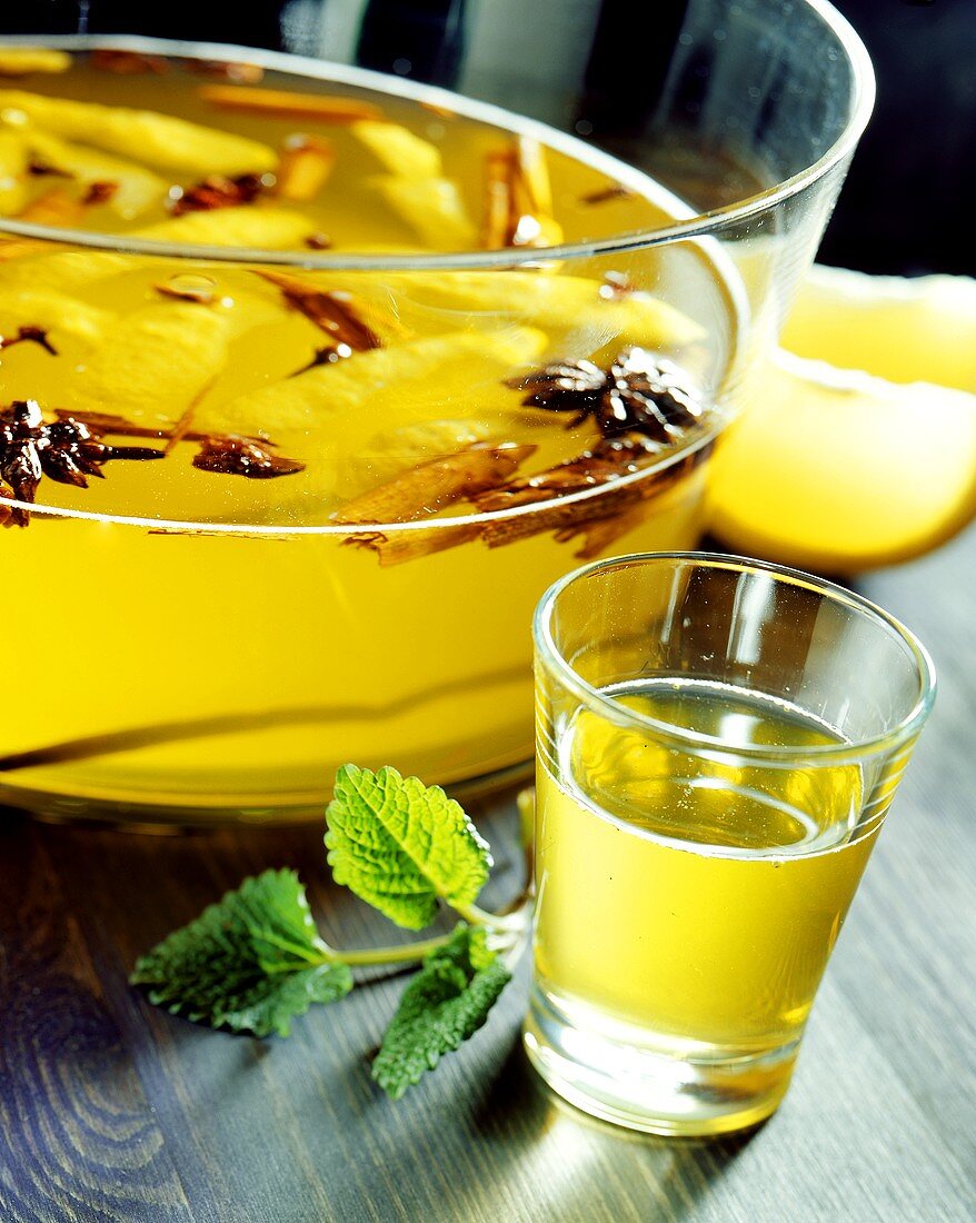 Lemon punch in glass and bowl