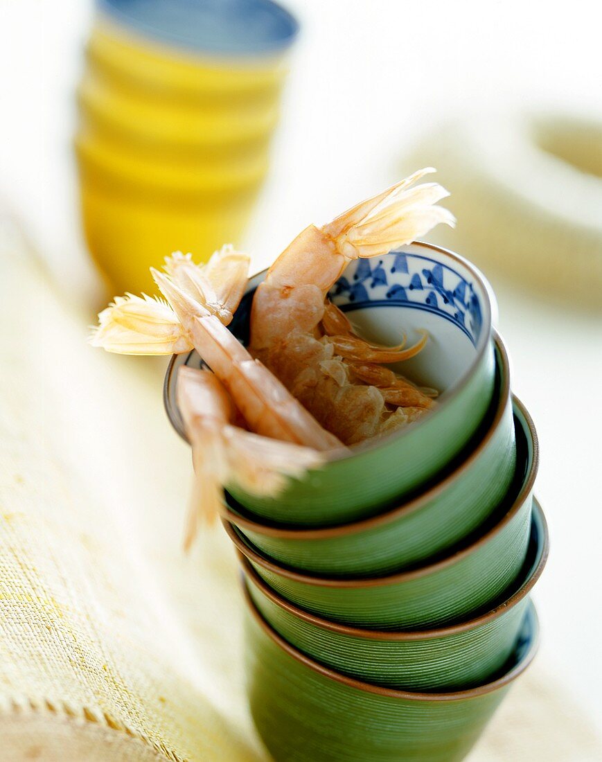 Asian eating bowls and cooked shrimps