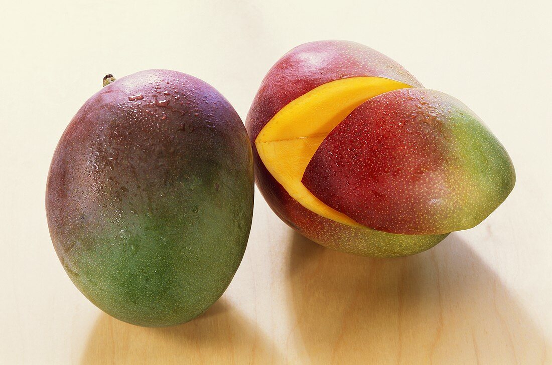 Mango (Kent variety) with drops of water