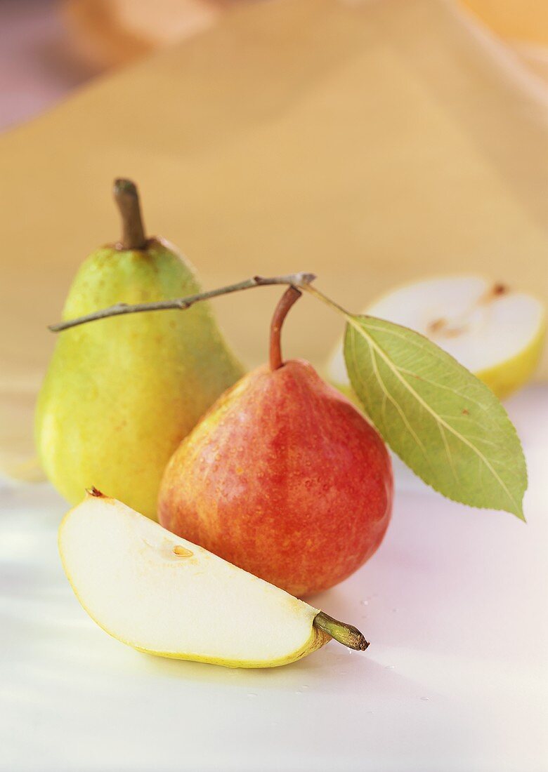 Pears with stalk and leaf and wedge of pear