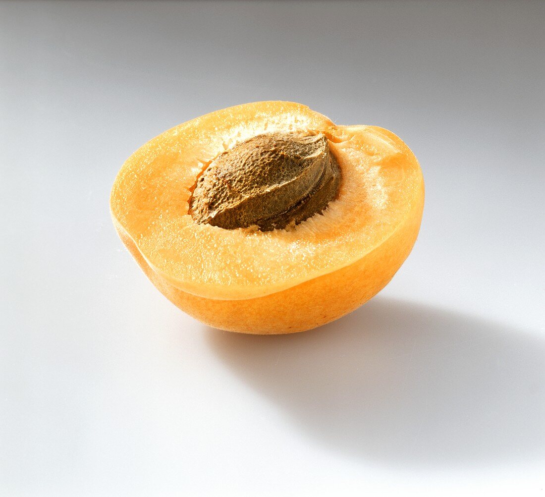 Half apricot with stone