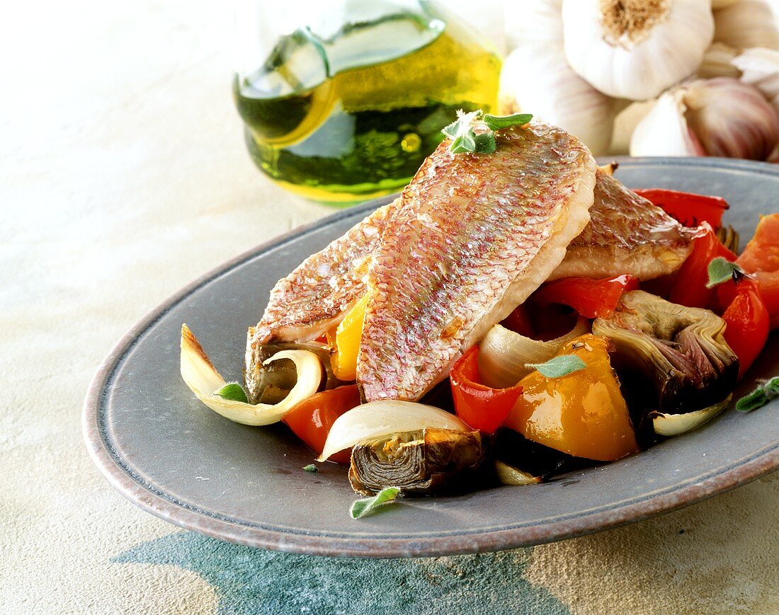 Red mullet with roasted artichokes and peppers