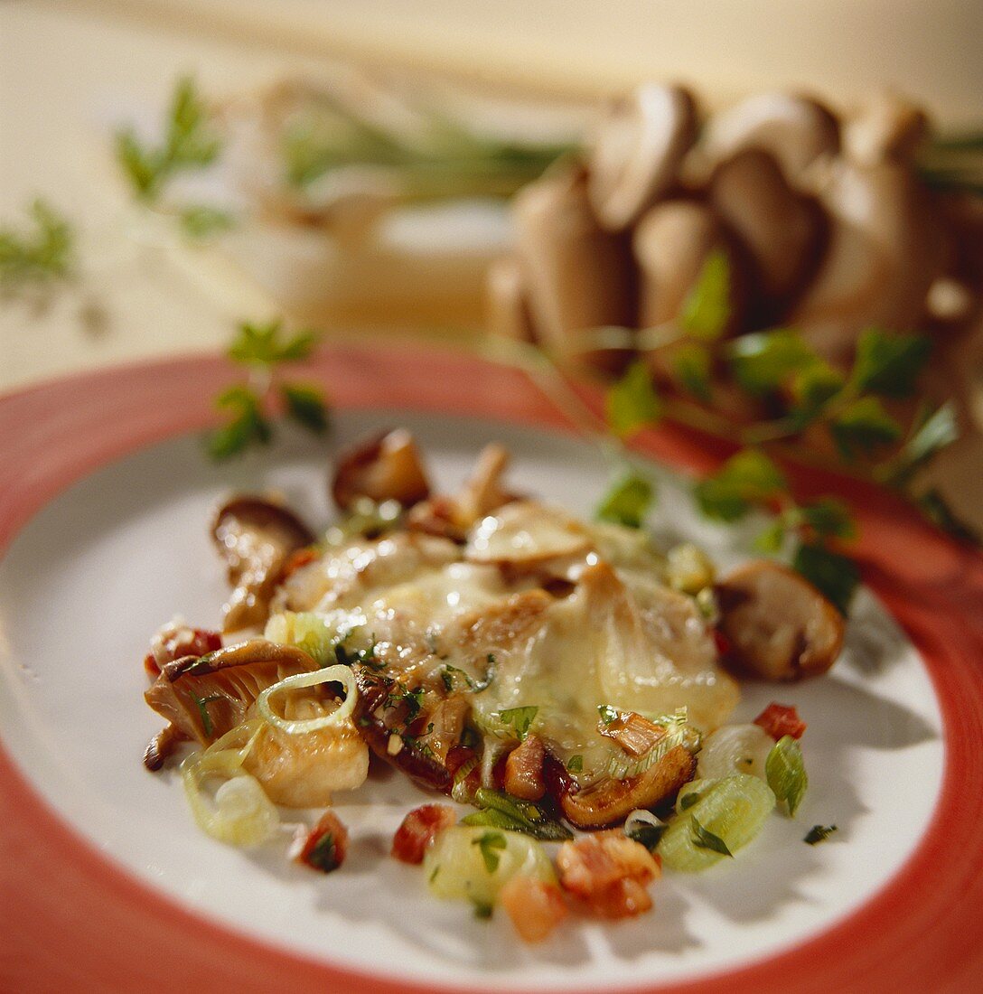Mushroom raclette with bacon and spring onions