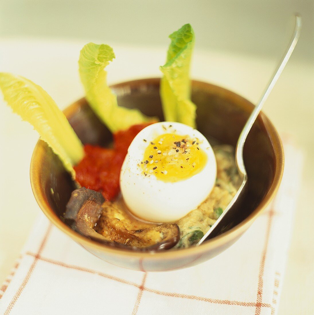 Soft egg and aubergine on risotto