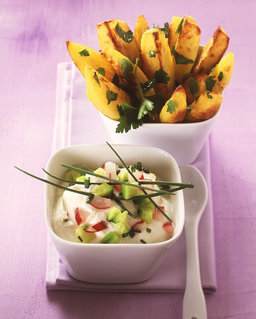 Herb potatoes with radishes in sour cream