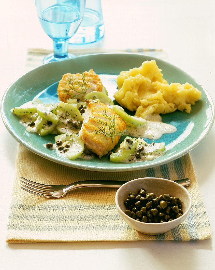 Coley fillet with braising cucumber, capers & mashed potato