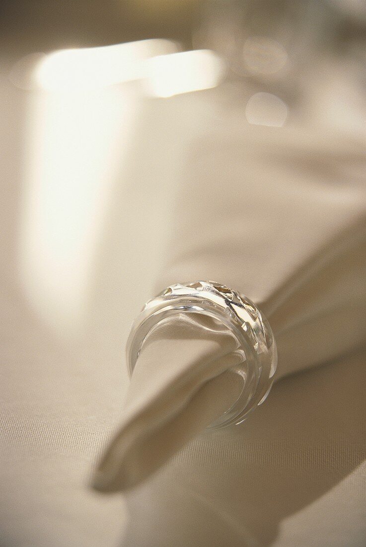 White napkin with elegant napkin ring