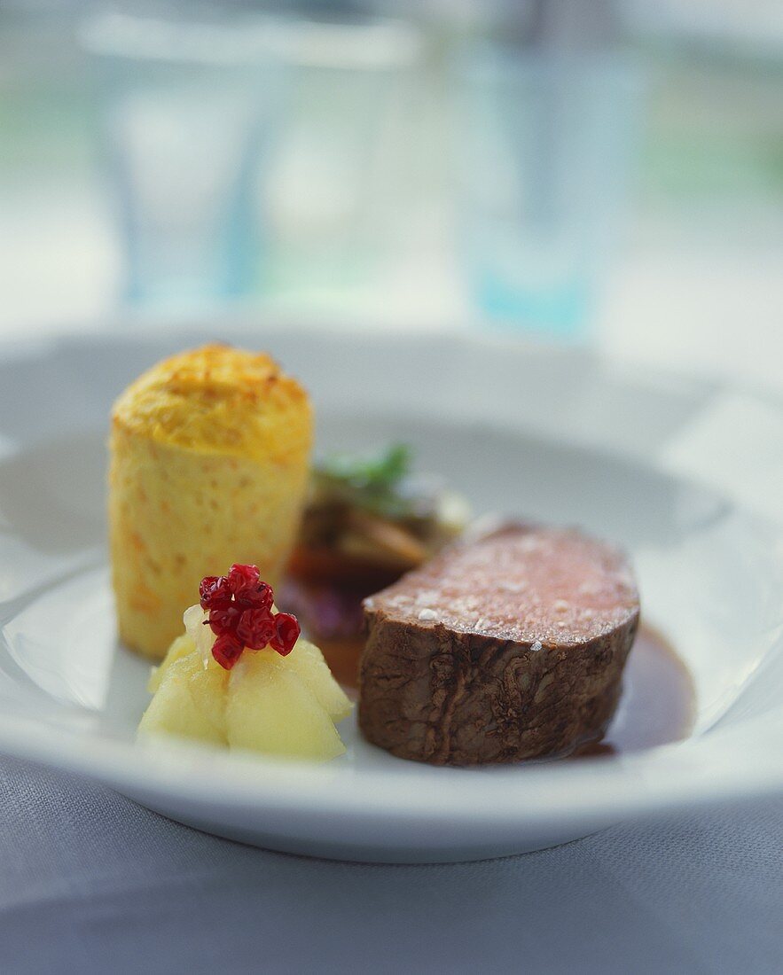Beef fillet with root vegetable muffin and apple compote