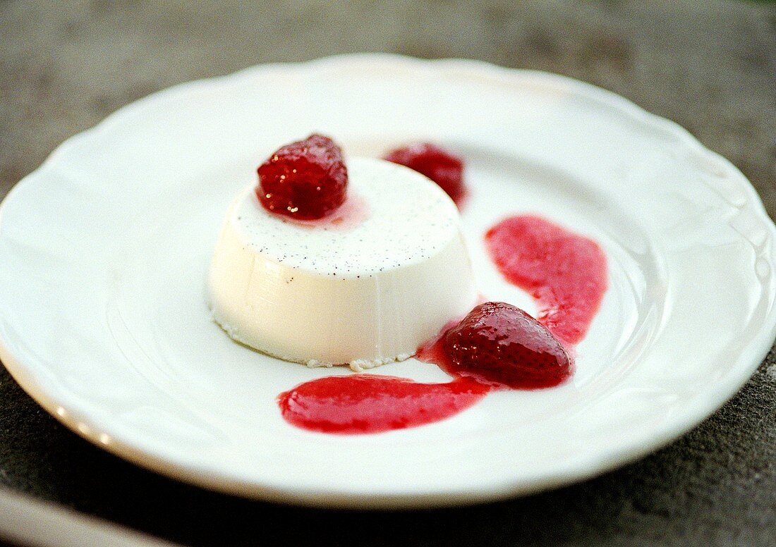Cream mould with berry sauce