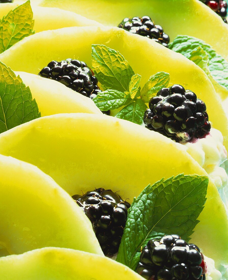 Minted quark cake with blackberries & melon (close-up)