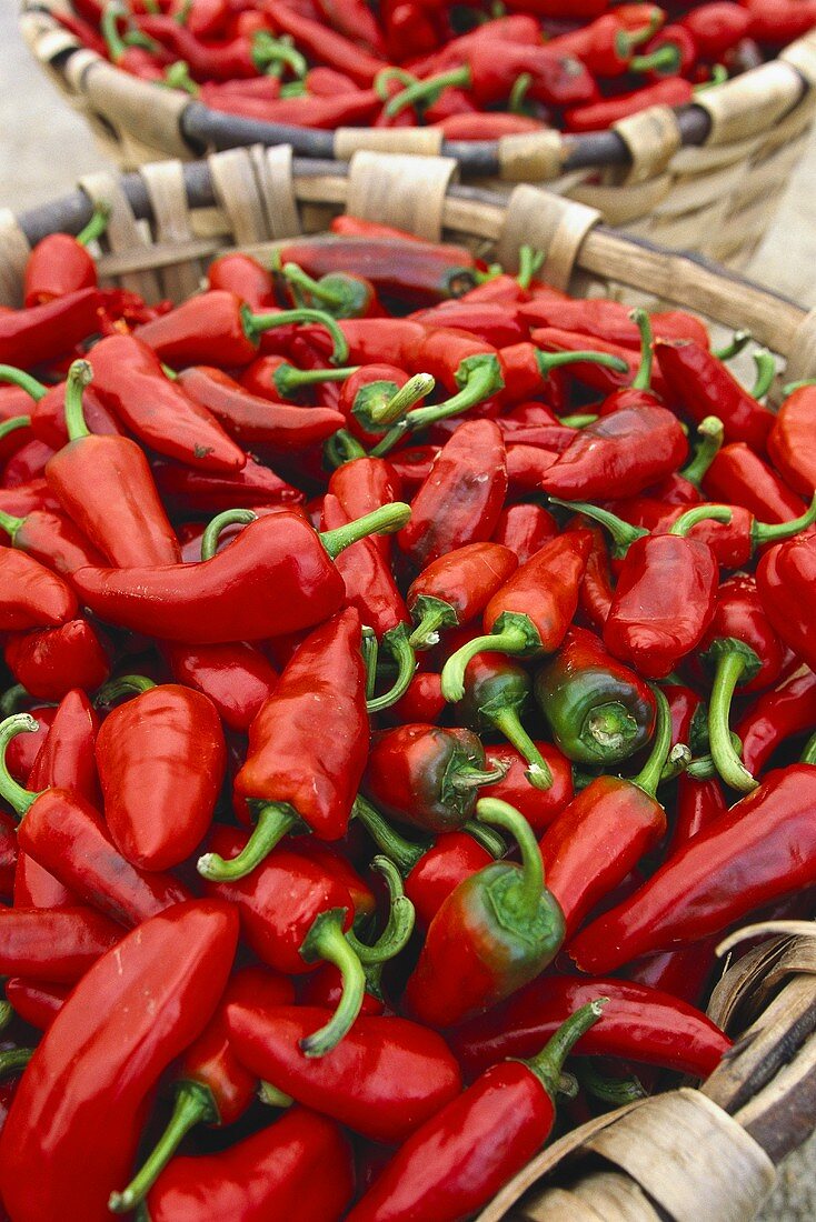 Fresh red chili peppers in baskets