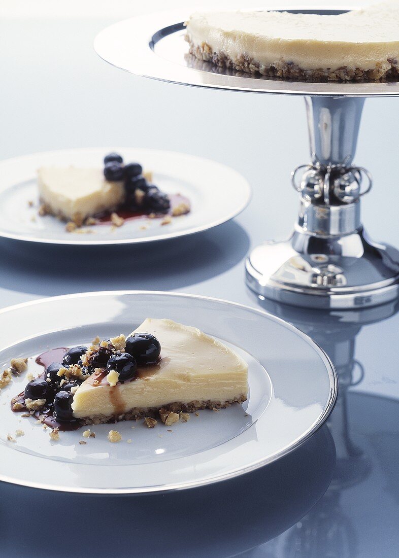 White chocolate tart with blueberry sauce