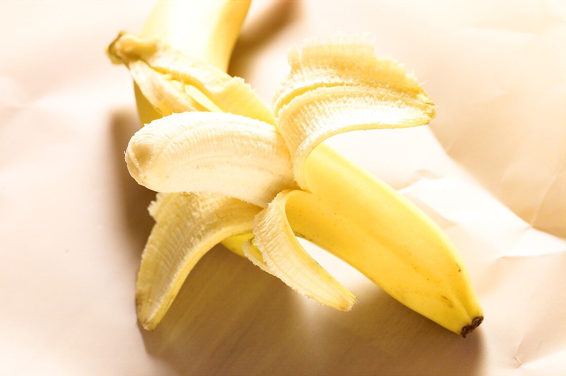 Banana, half-peeled
