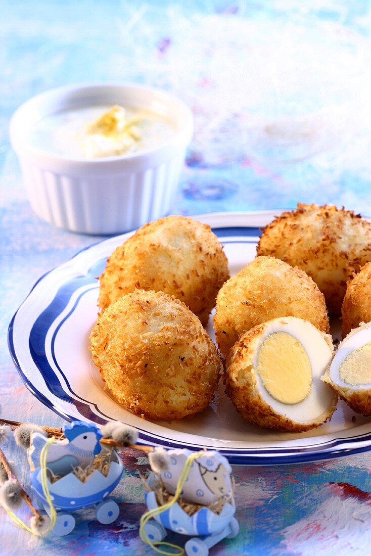 Boiled eggs in coconut panade