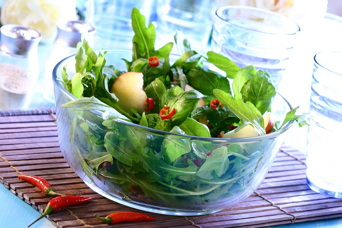 Dandelion salad with apples and chillies