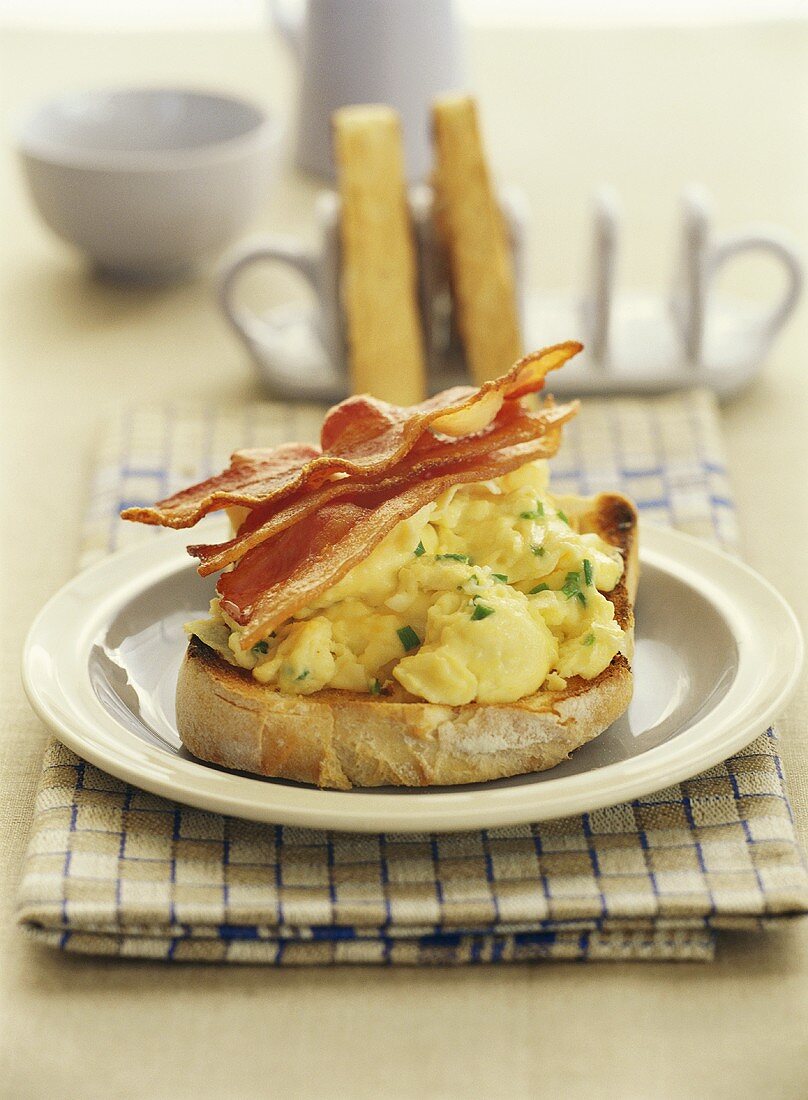 Toast with scrambled egg and bacon