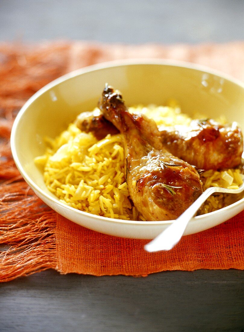 Chicken legs with curried rice