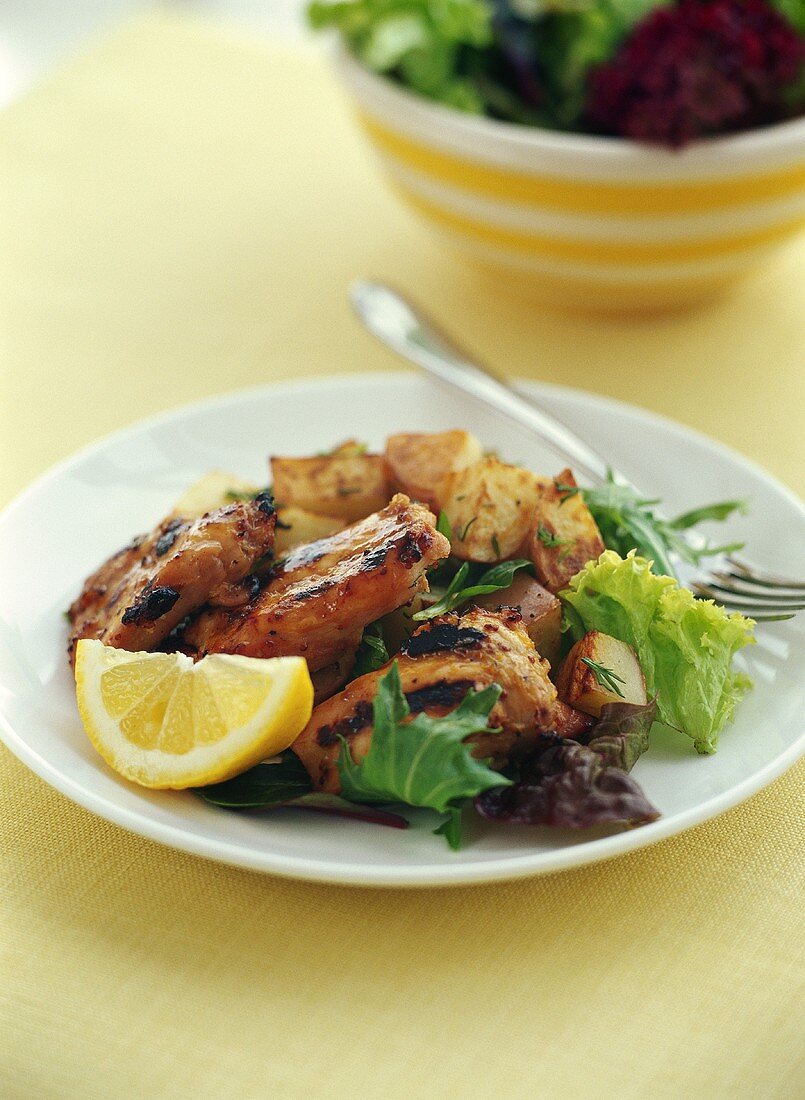 Marinated chicken with roast potatoes