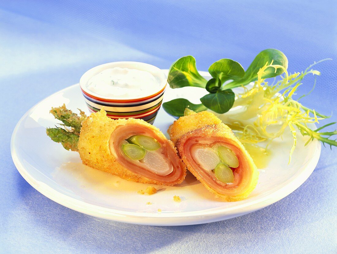 Breaded ham and asparagus rolls with chive quark