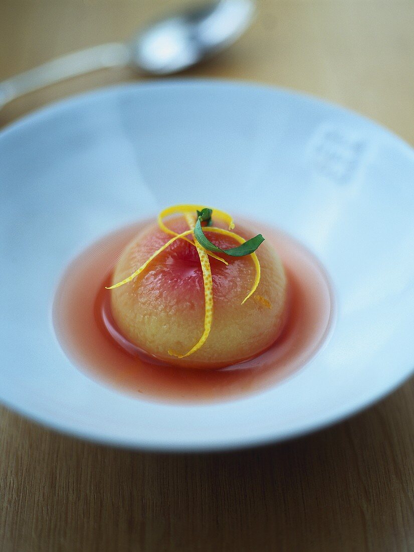 Poached peach in syrup