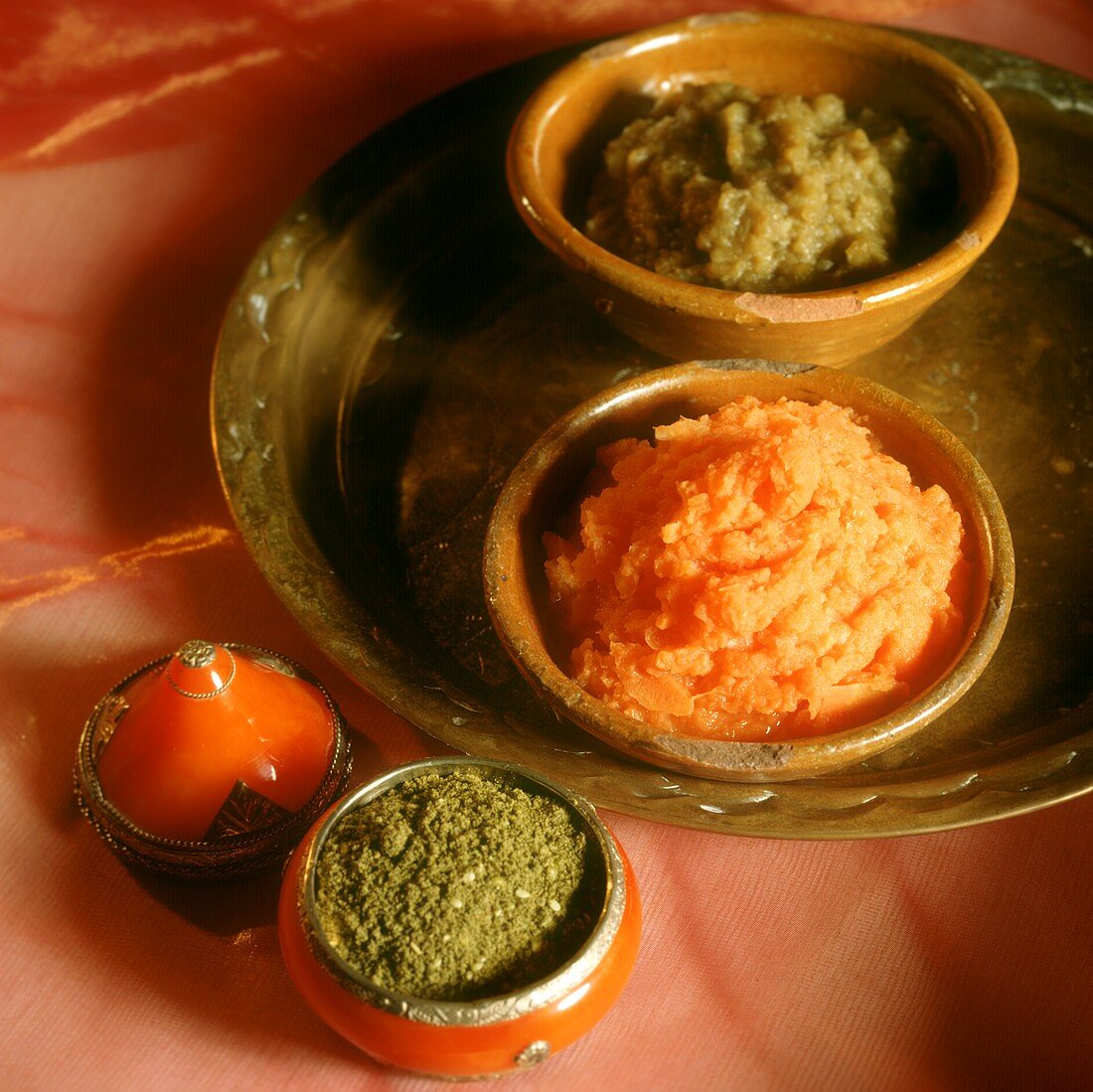 Aubergine dip, carrot dip and za’atar (spice, N. Africa)