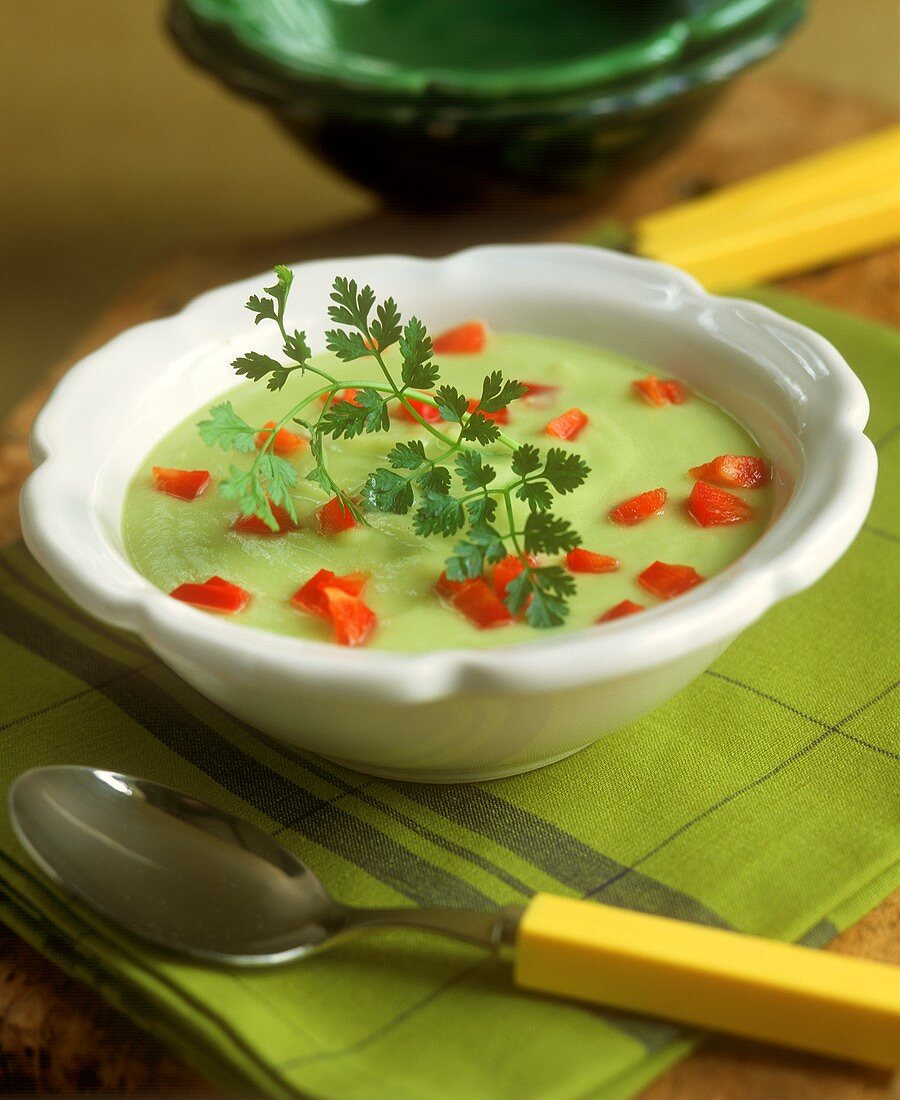 Avocado soup with diced peppers