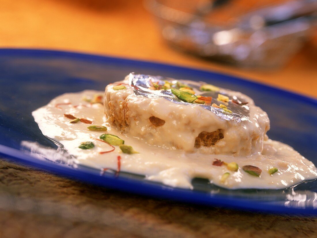 Shahi tukra (bread pudding with cream sauce, India)