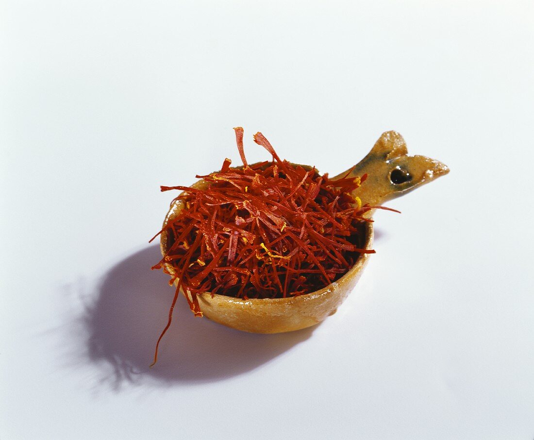Saffron threads in small bowl