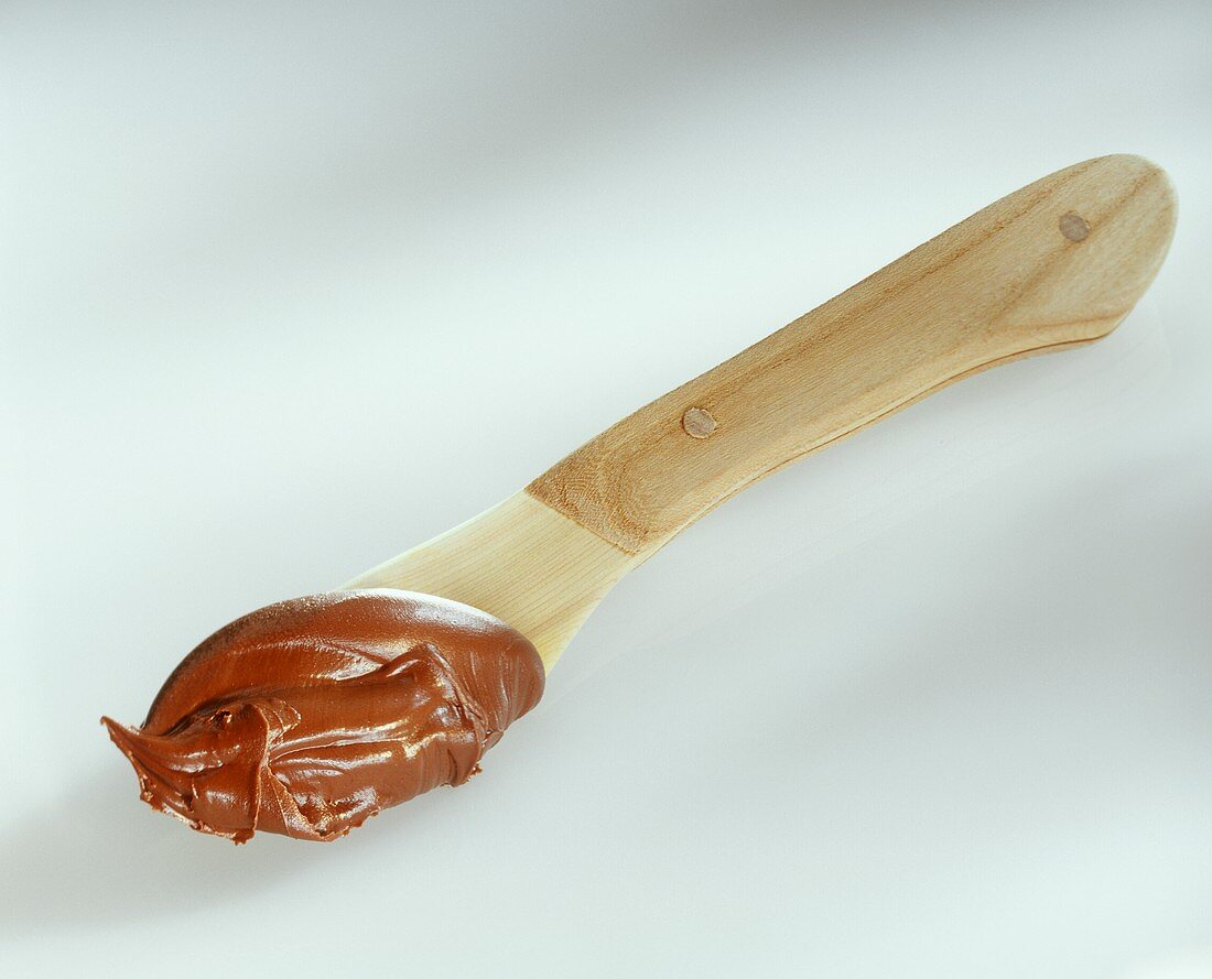 Nutella on wooden spoon