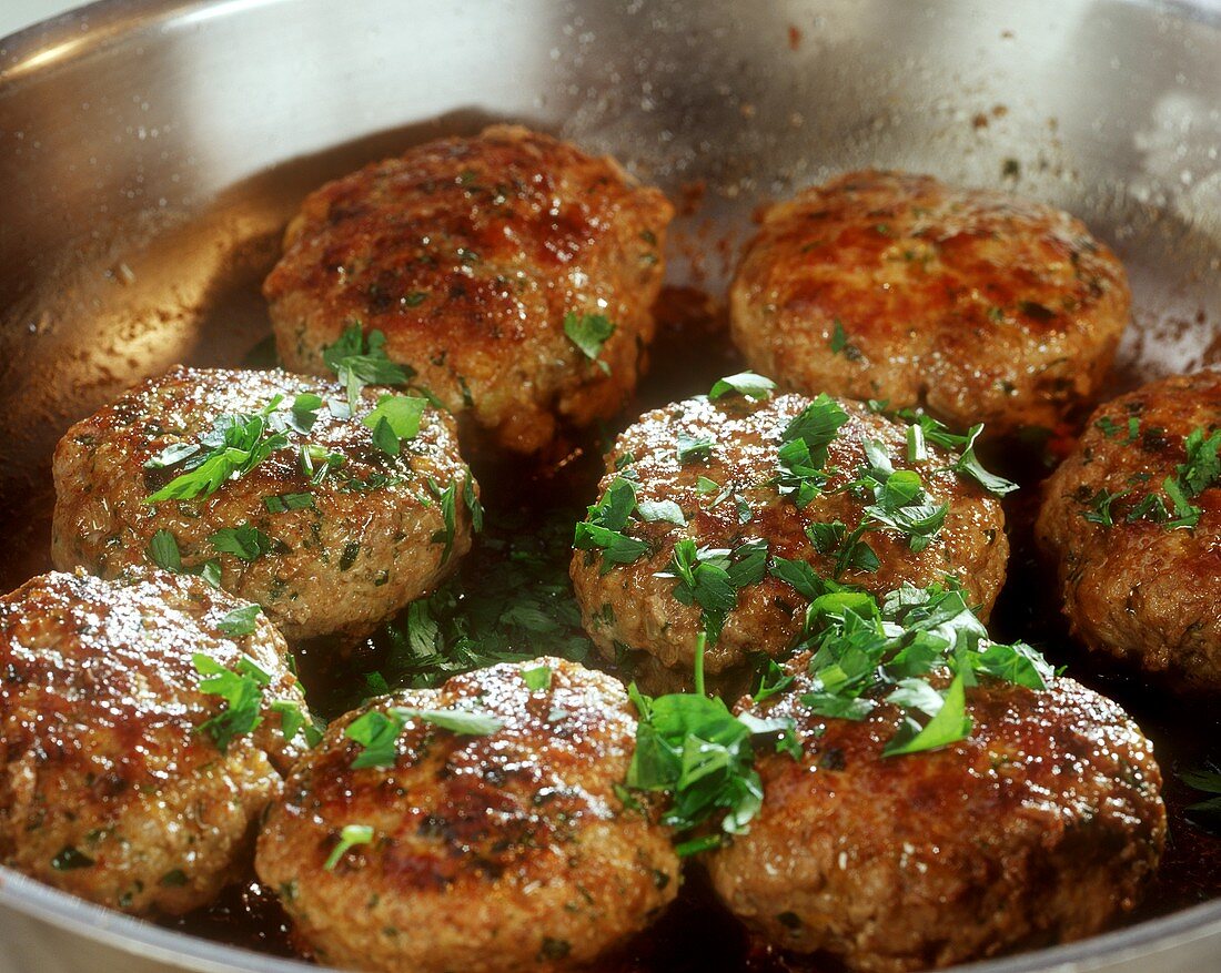 Rissoles in frying pan