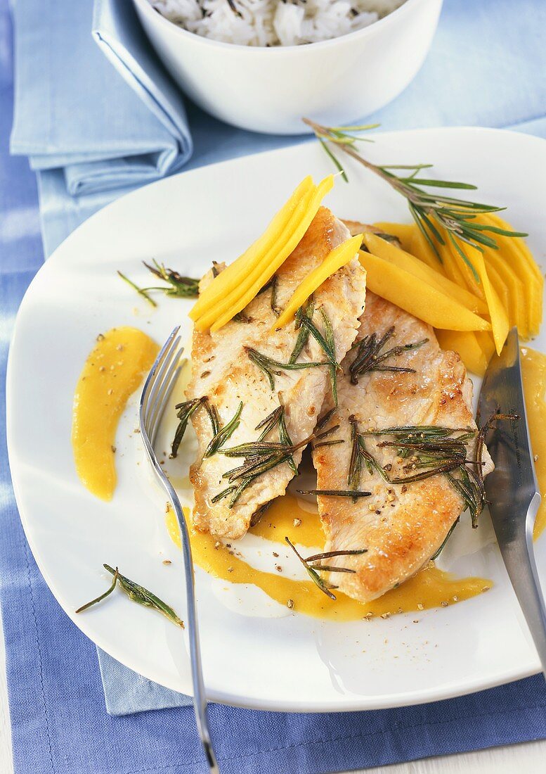 Turkey escalope with mango and rosemary