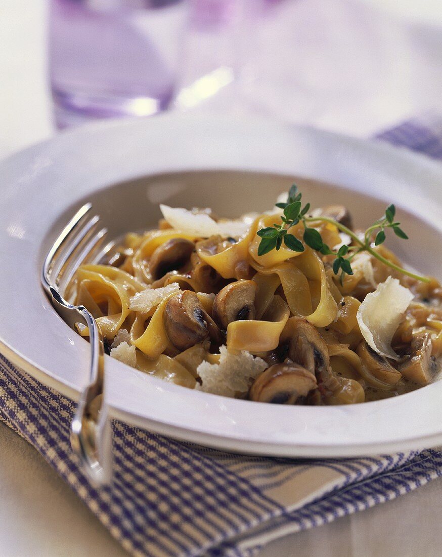 Ribbon pasta with mushroom and mascarpone sauce