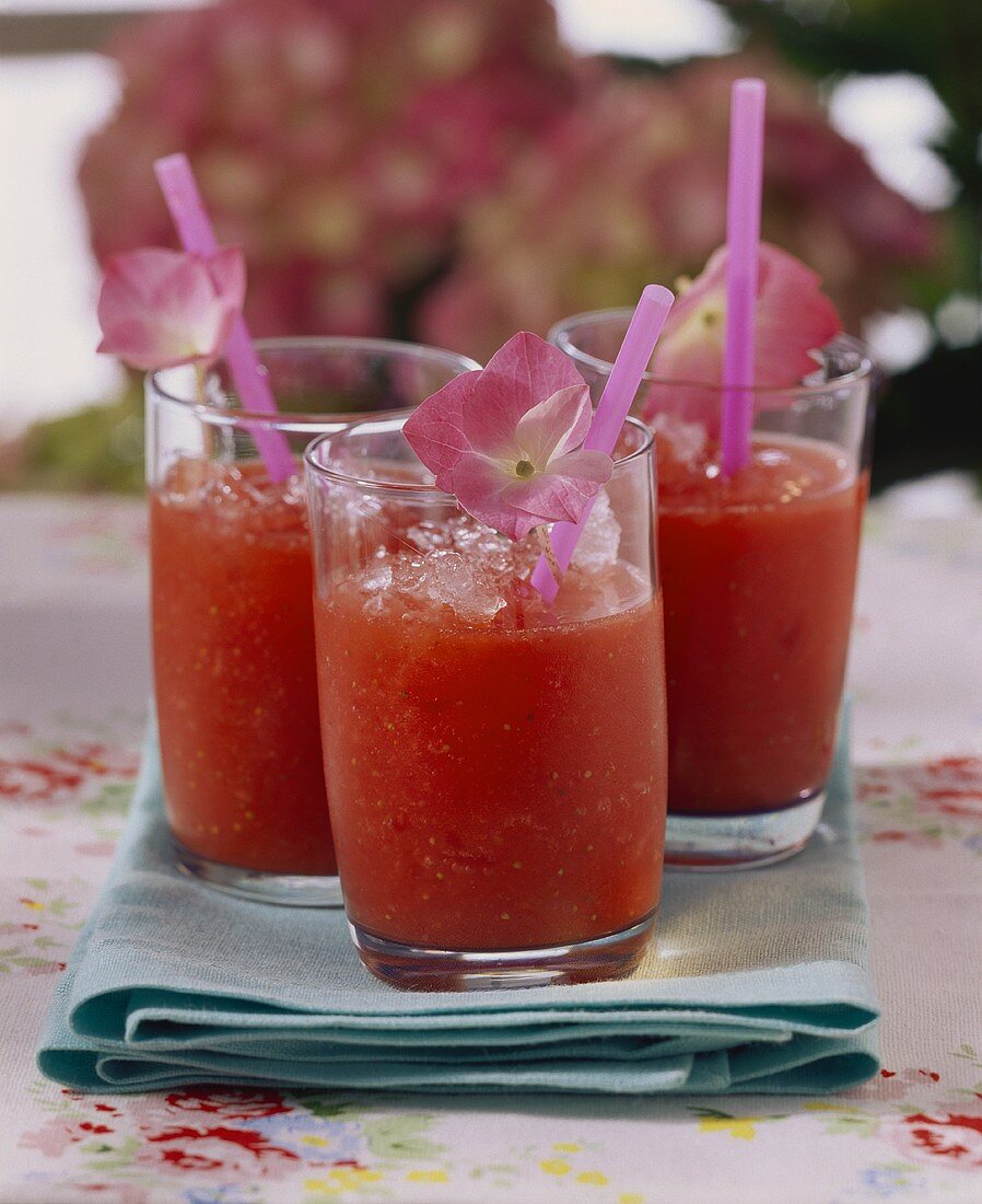 Three strawberry daiquiris