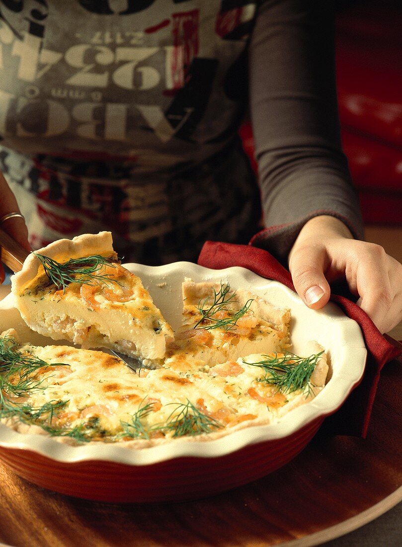 Cutting a shrimp quiche