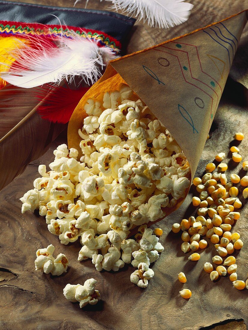 Popcorn in paper bag and Carnival decorations