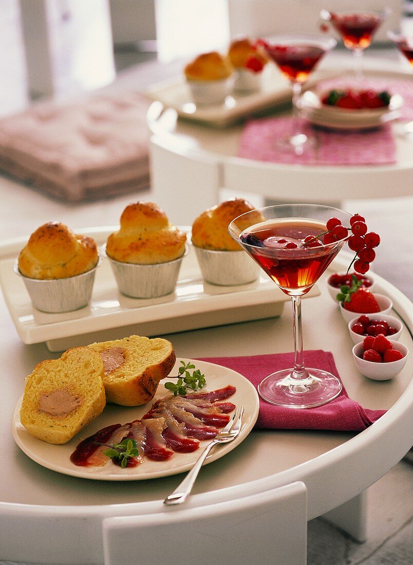 Brioches with goose liver and duck breast; Kir Royal