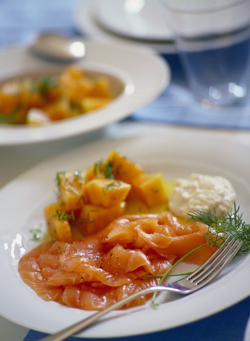 Salmon carpaccio with melon and horseradish