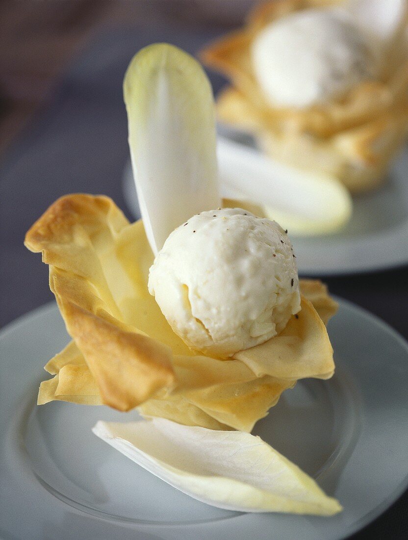 Cheese ice cream with chicory in filo pastry