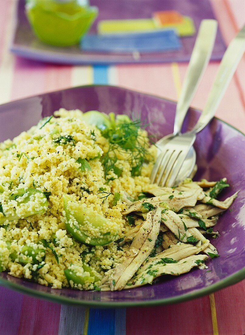 Couscous salad with green tomatoes, herbs and fish