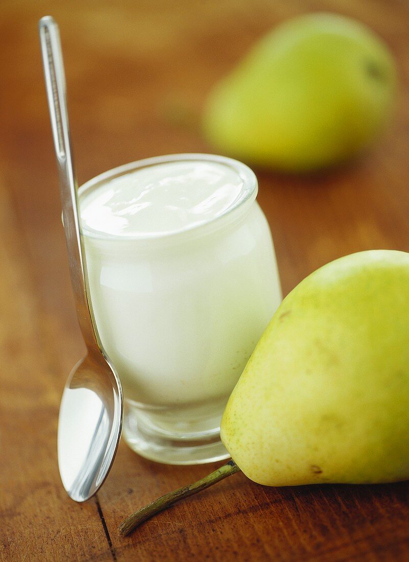 Jar of yoghurt and fresh pears
