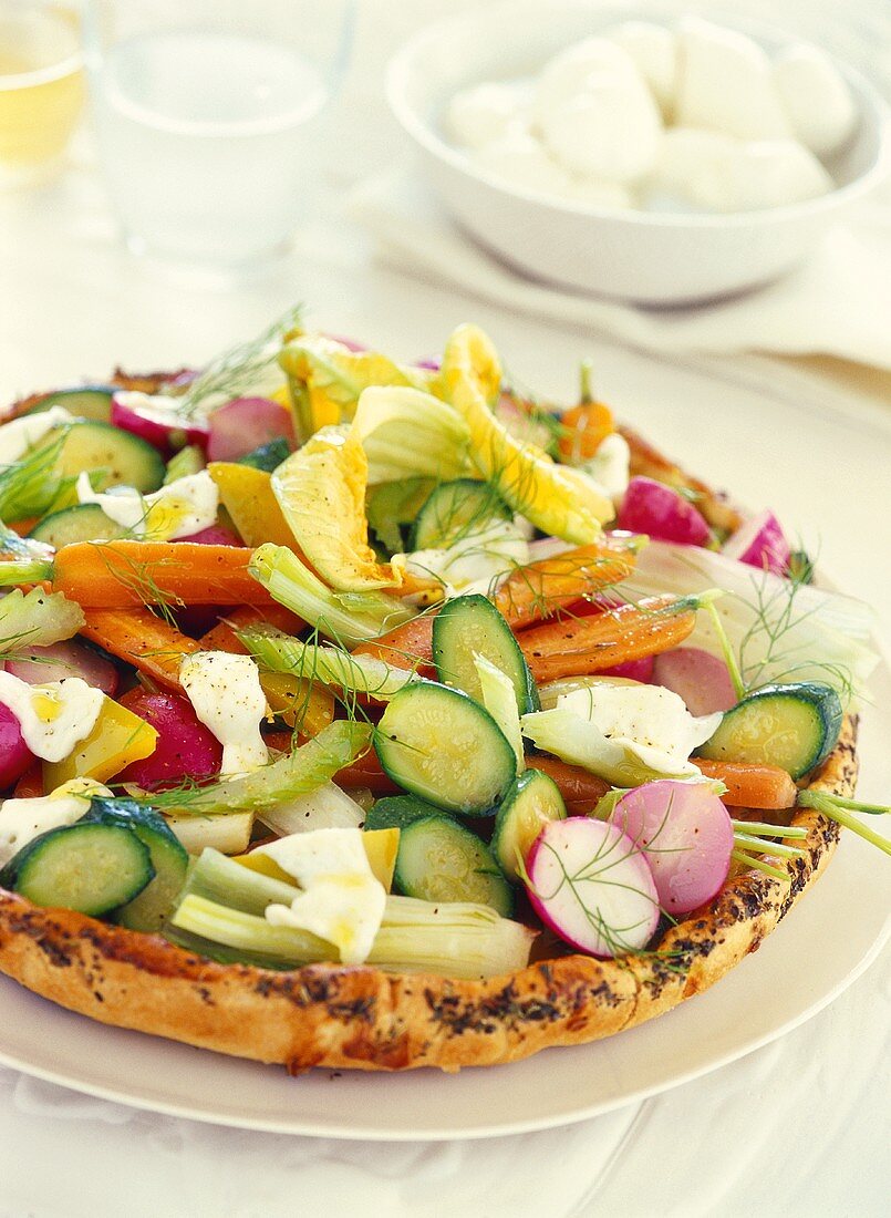 Pizza with vegetables and mozzarella