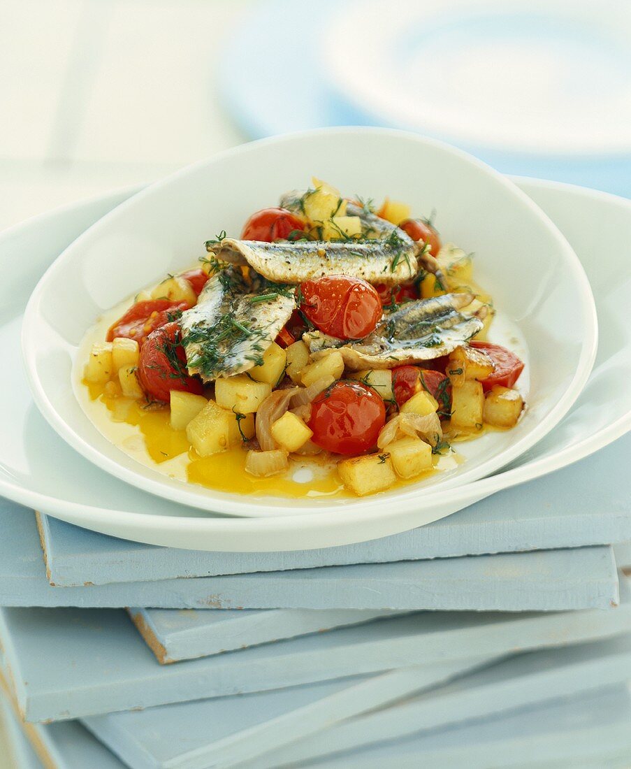 Anchovies with cherry tomatoes and potatoes